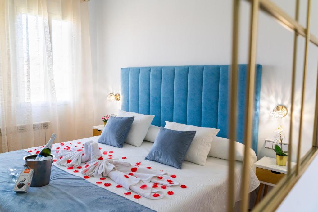 Postel nebo postele na pokoji v ubytování Hotel Puerta de Cazorla