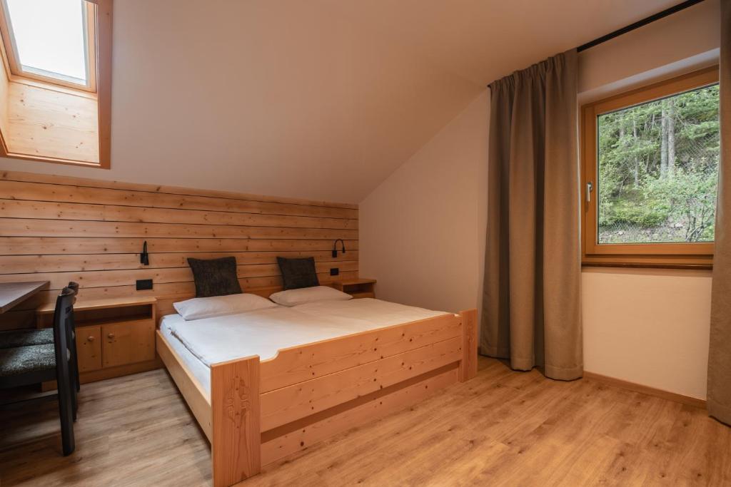 Postel nebo postele na pokoji v ubytování Apartments Kranebitt