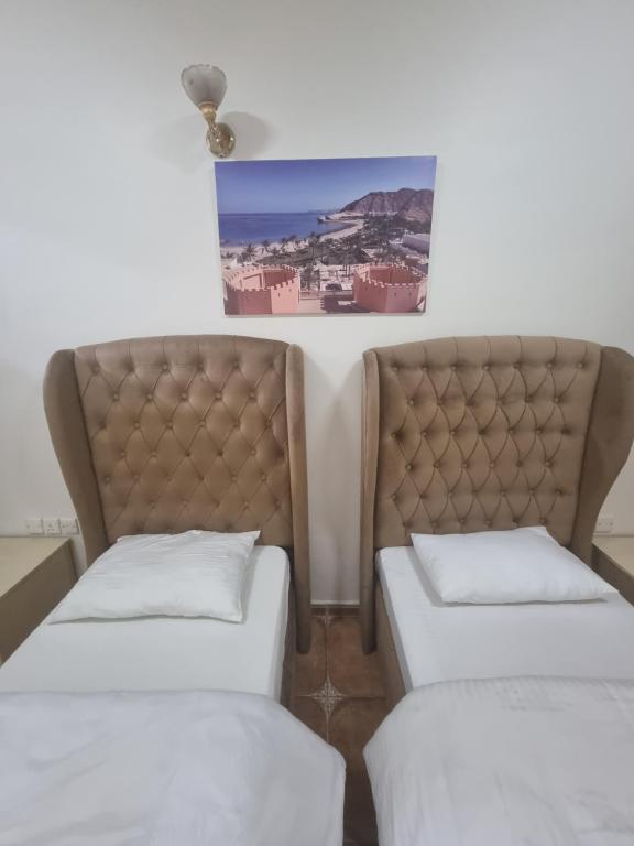 Postel nebo postele na pokoji v ubytování Marhabaa hotel Al Amarat