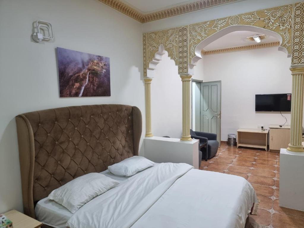 TV a/nebo společenská místnost v ubytování Marhabaa hotel Al Amarat