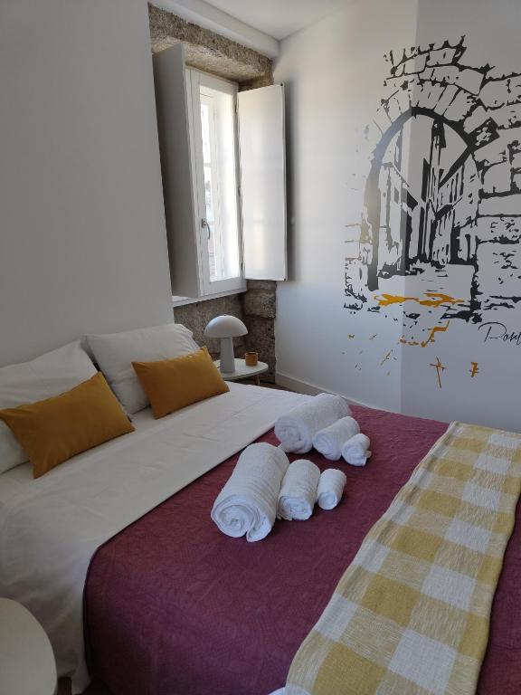 Postel nebo postele na pokoji v ubytování Urbe Sanchina - Hostel & Suites