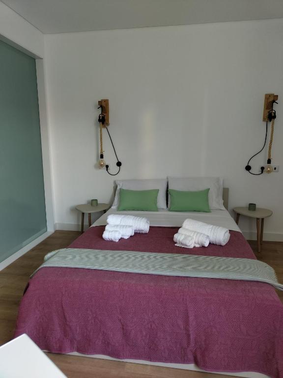 Postel nebo postele na pokoji v ubytování Urbe Sanchina - Hostel & Suites