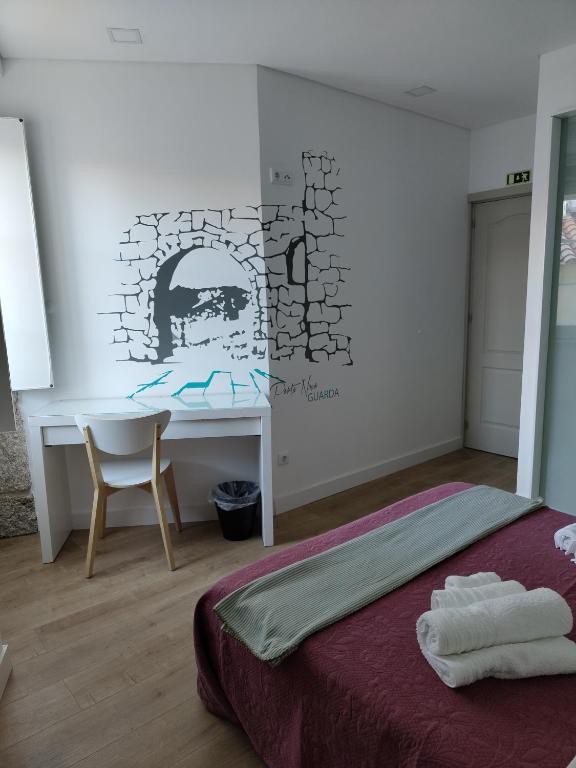 Postel nebo postele na pokoji v ubytování Urbe Sanchina - Hostel & Suites