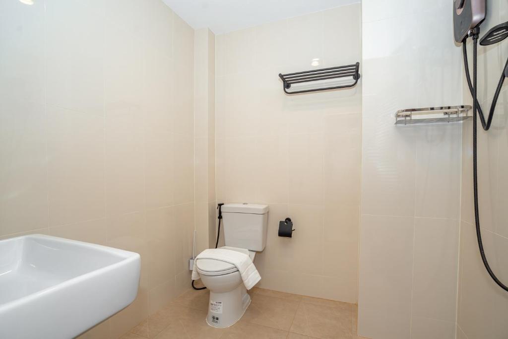 Koupelna v ubytování Mitsu Guesthouse
