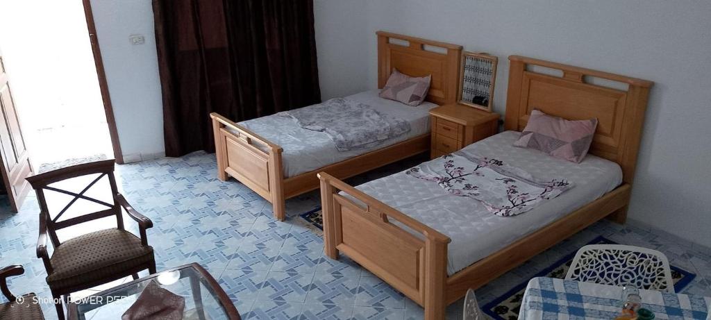 Postel nebo postele na pokoji v ubytování jasmain