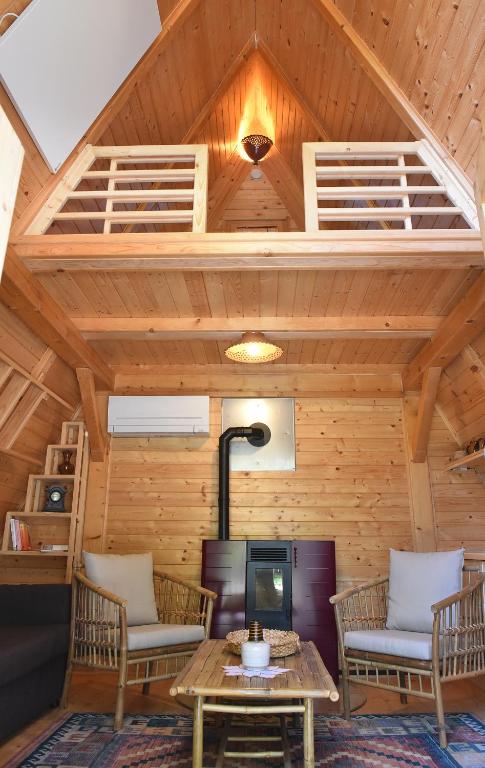Area soggiorno di Glamping and wellness cottage Salvus