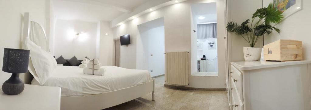 Postel nebo postele na pokoji v ubytování Il Peccato Originale