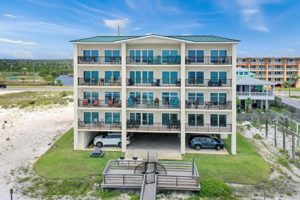 an aerial view of a beachfrontominium building at One More Time Again by Pristine Properties Vacation Rentals in Mexico Beach