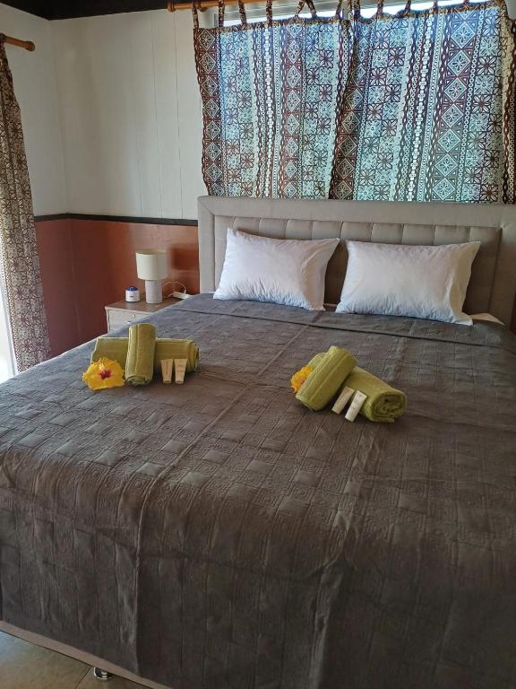 Postel nebo postele na pokoji v ubytování Villa VAIROARII Moorea
