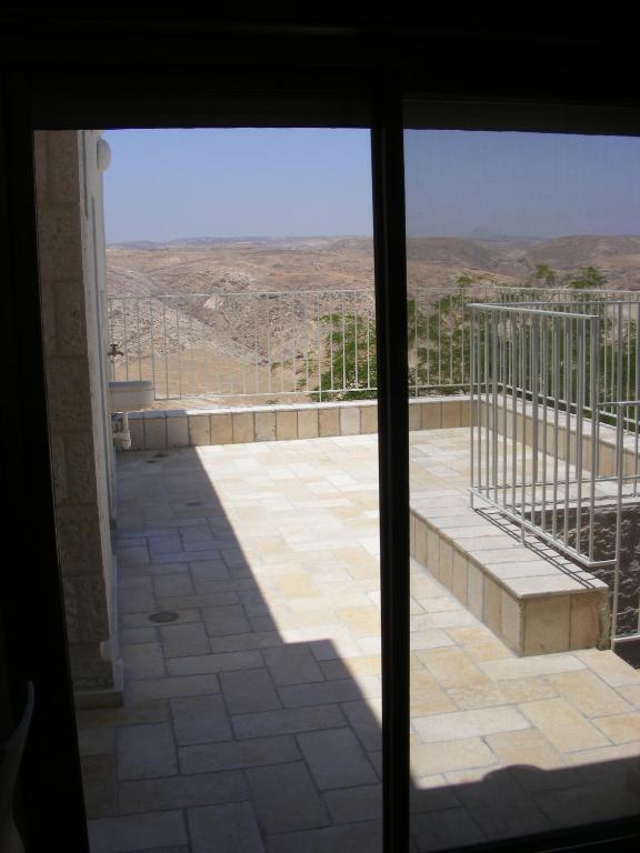 a view from a window of a patio at Nof Canaan in Kfar Adumim