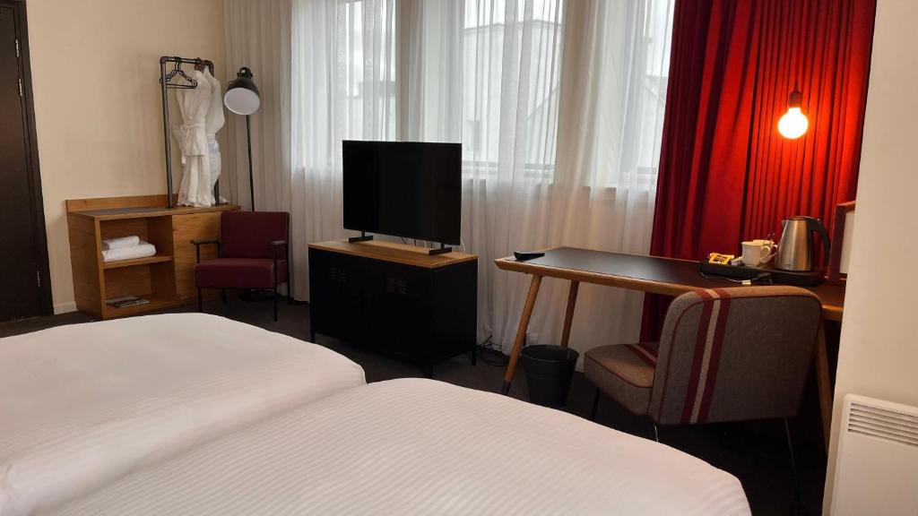 Postel nebo postele na pokoji v ubytování B&B HOTEL Inverness