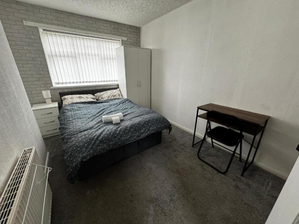 Ένα ή περισσότερα κρεβάτια σε δωμάτιο στο Double Room XXXX Manchester