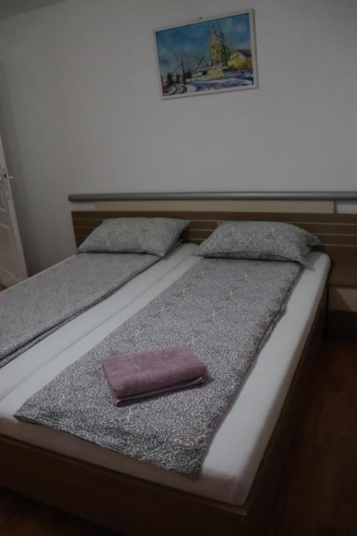 Postel nebo postele na pokoji v ubytování Cabană în inima munților - Gálkuti Kulcsosház