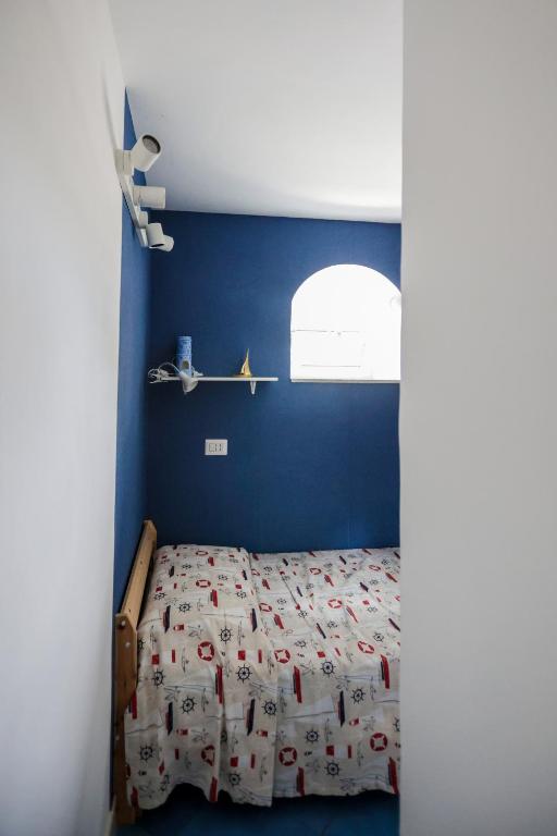 Postel nebo postele na pokoji v ubytování Attico Panoramico