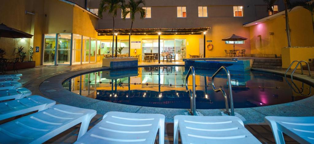 Bazén v ubytování Hotel Hostal de Cortés nebo v jeho okolí