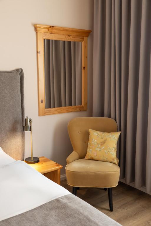 Postel nebo postele na pokoji v ubytování Hotel Kadoor