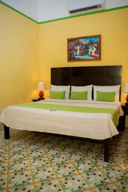 Postel nebo postele na pokoji v ubytování Hotel del Peregrino Boutique Hotel