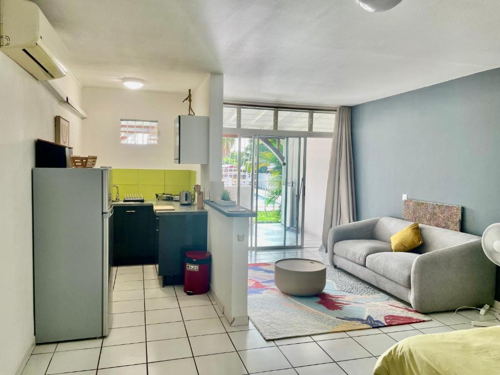 Posezení v ubytování La maison bleue 20 rue Aubin Edmond