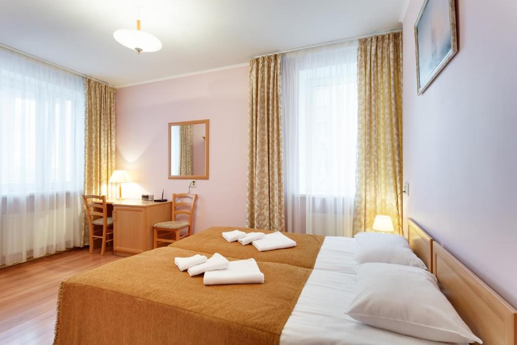 Cama o camas de una habitación en Diadema Apart Hotel
