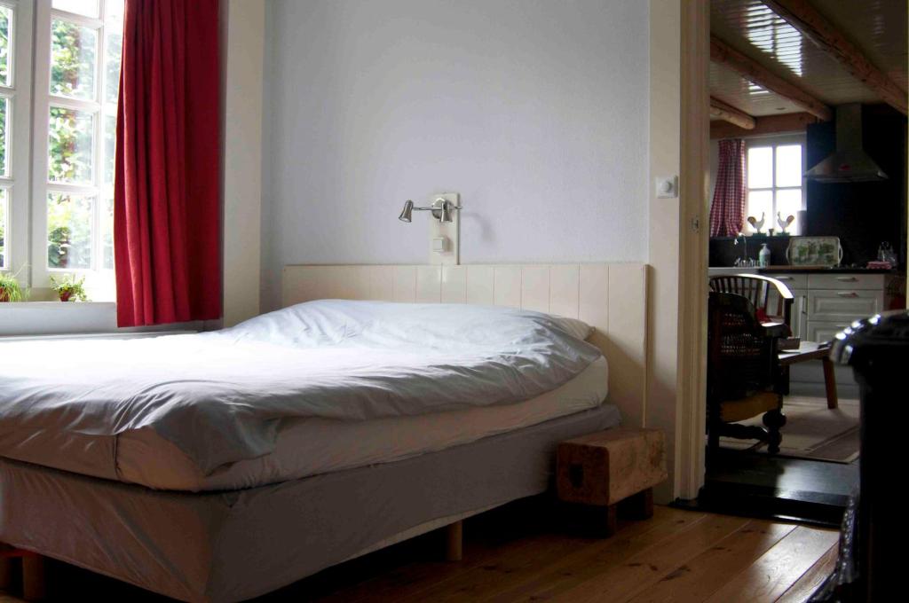 Postel nebo postele na pokoji v ubytování B&B Maarle