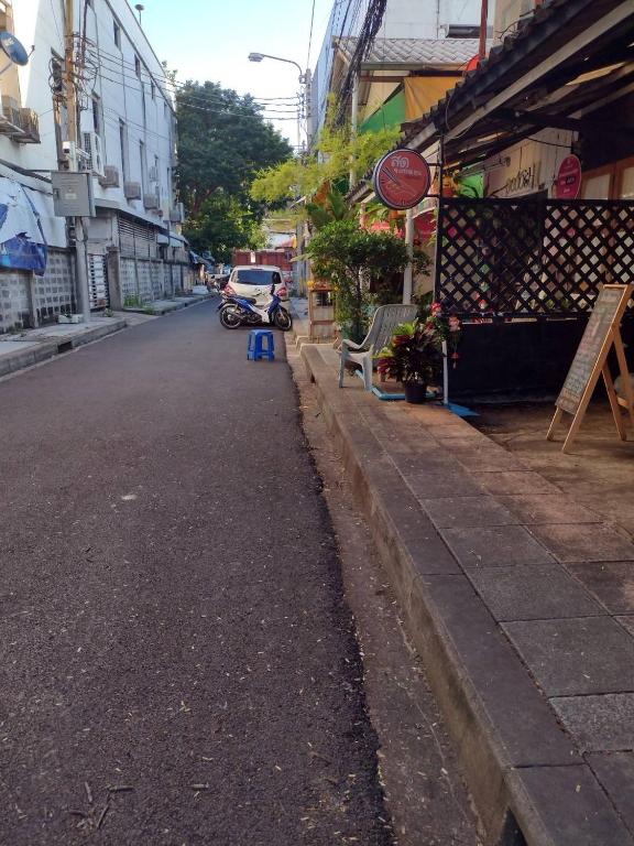 a street with a motorcycle parked on the side of the road at 362 สวนอ้อย5 in Dusit