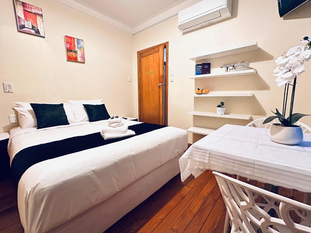 Postel nebo postele na pokoji v ubytování Harrison Motel Papatoetoe