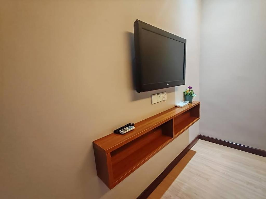 TV a/nebo společenská místnost v ubytování Hotel Prima