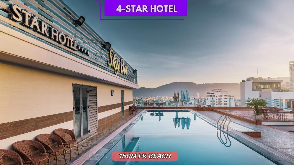 a view of a swimming pool at a star hotel at Star Hotel and Spa Danang in Danang