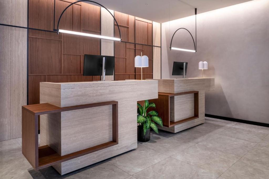 TV a/nebo společenská místnost v ubytování AC Hotel by Marriott Clodio Roma