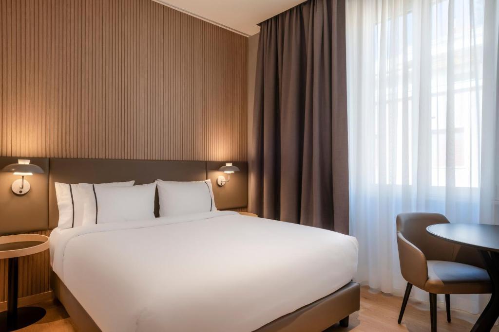 Postel nebo postele na pokoji v ubytování AC Hotel by Marriott Clodio Roma