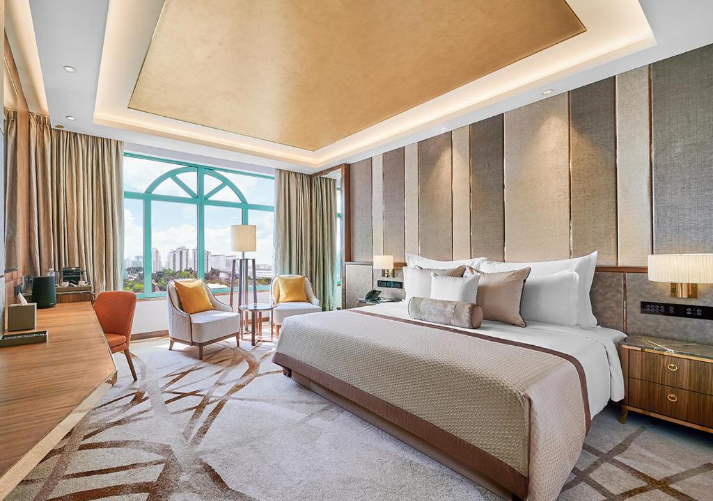 Letto o letti in una camera di Sunway Resort Hotel