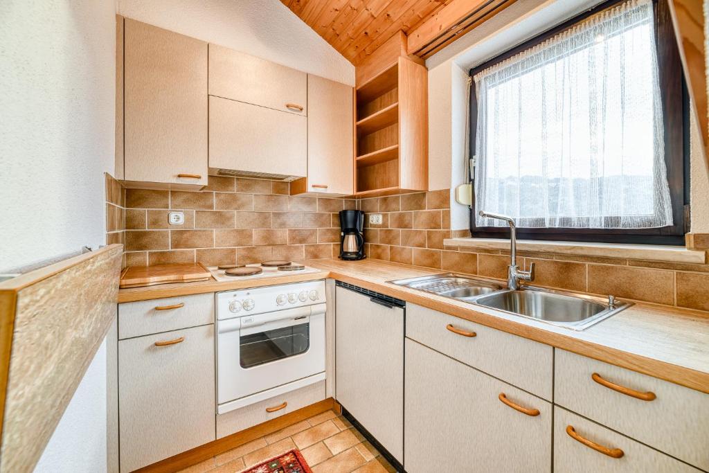 Kuchyň nebo kuchyňský kout v ubytování Gasthaus Hecht