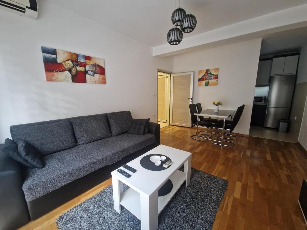 Posezení v ubytování Apartman Tri S
