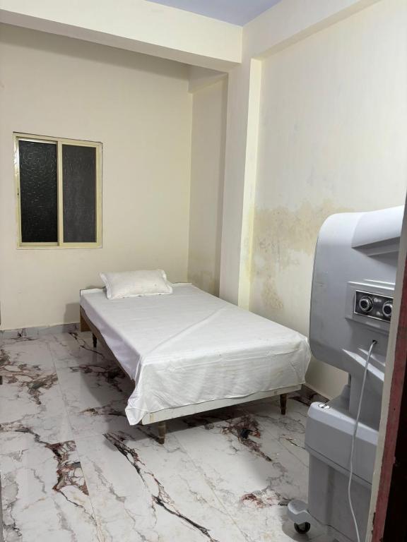 Letto o letti in una camera di BSSN Guest House