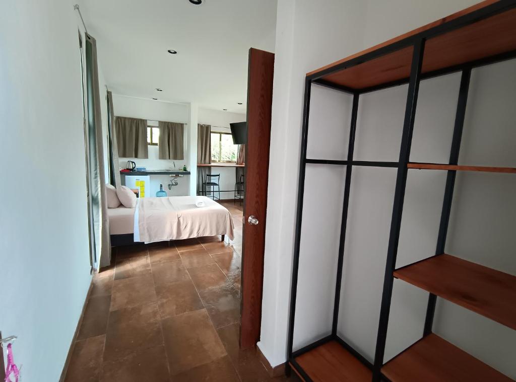 Postel nebo postele na pokoji v ubytování Hotel Miriam Bacalar