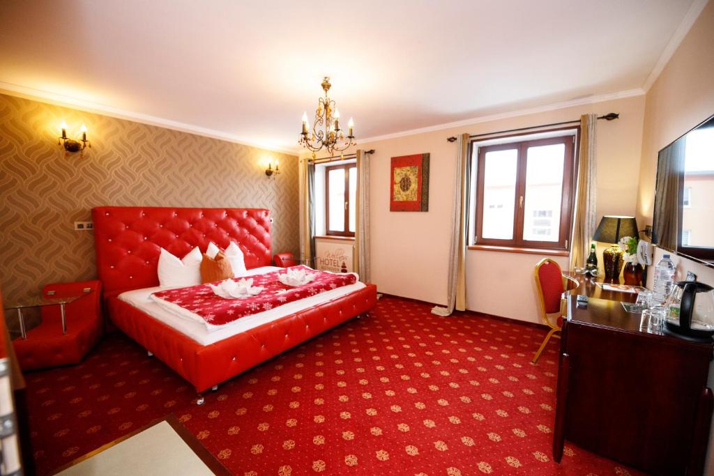 Łóżko lub łóżka w pokoju w obiekcie Wellness Hotel Beethoven