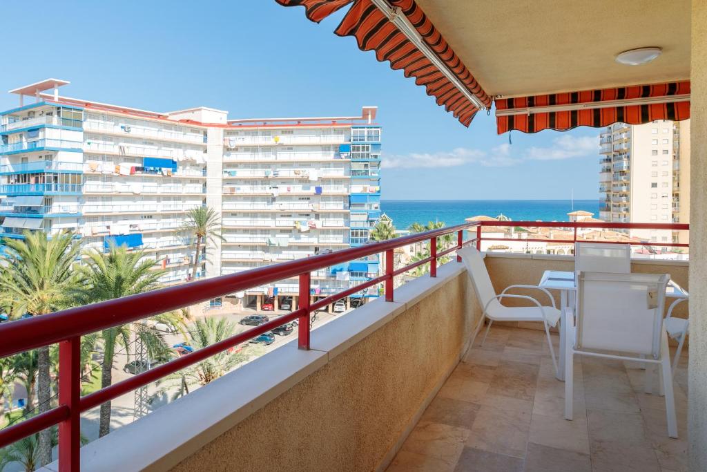 a balcony with a view of the ocean at Torre Mar Muchavista in El Campello
