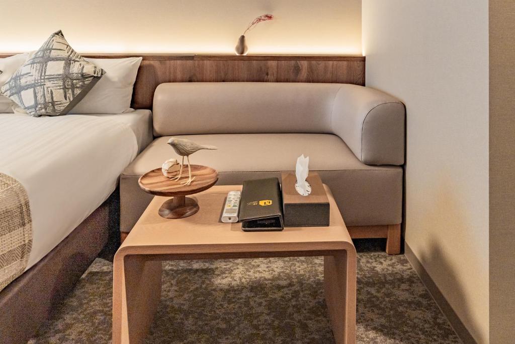 Posezení v ubytování Apartment Hotel 11 Tsutenkaku