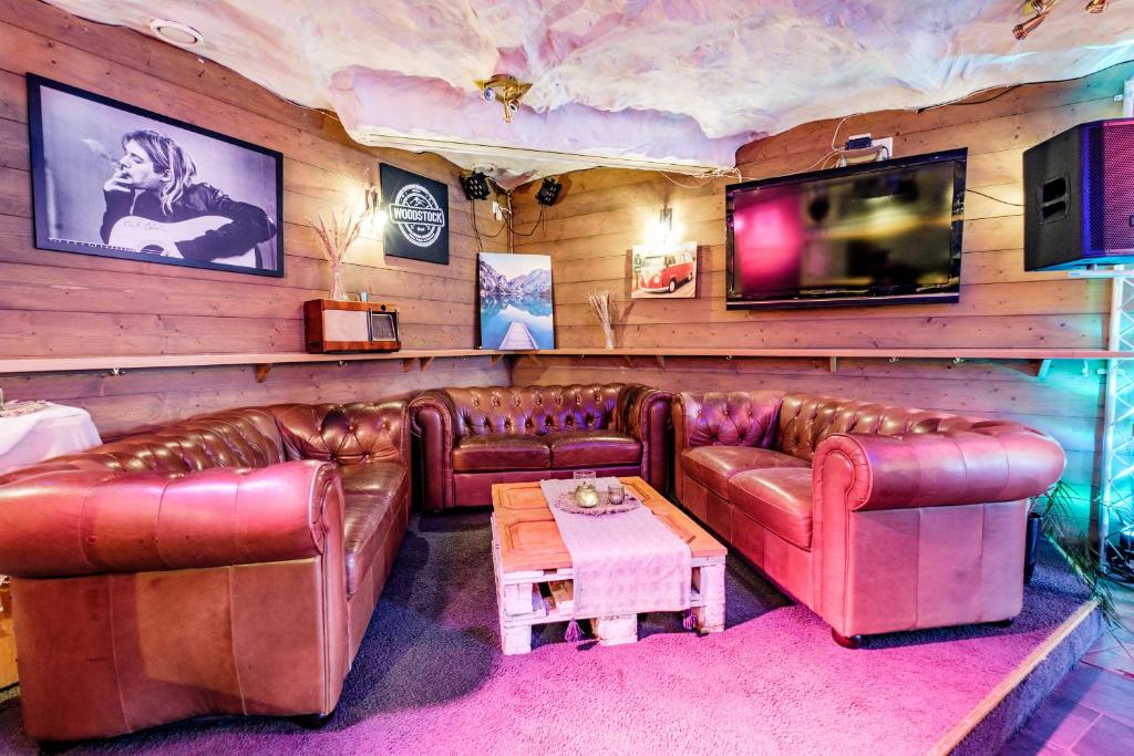 TV a/nebo společenská místnost v ubytování Loft1620