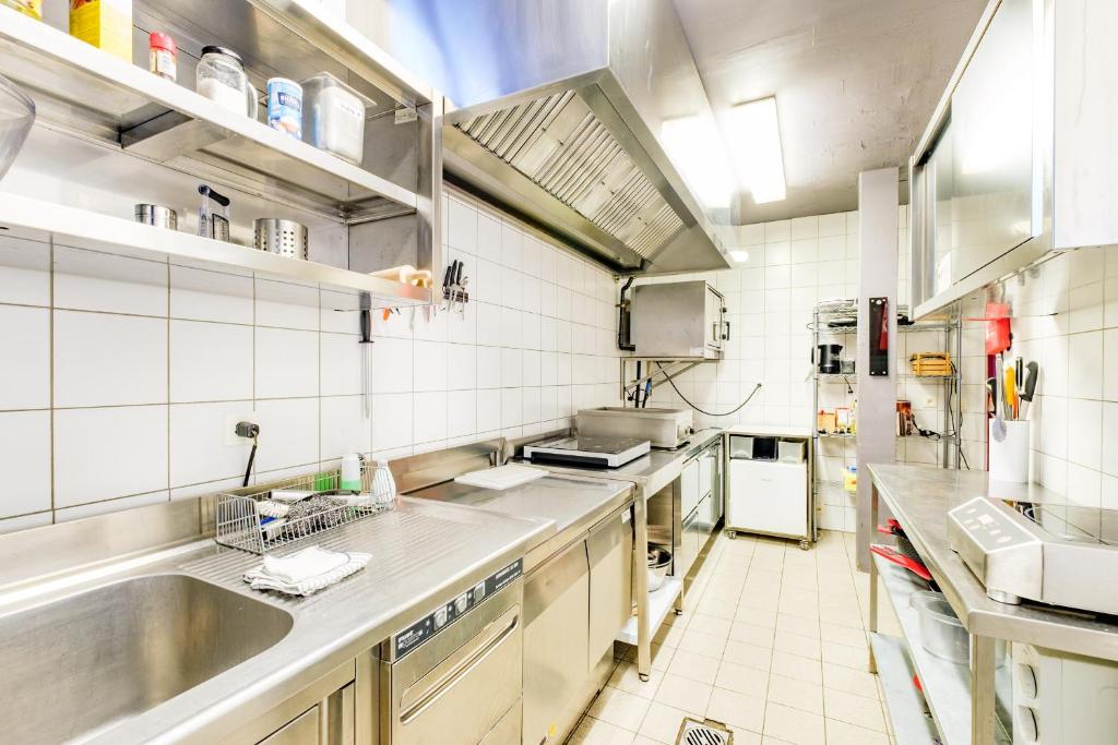 Kuchyň nebo kuchyňský kout v ubytování Loft1620
