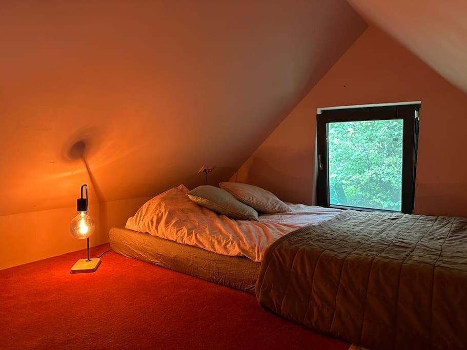 Postel nebo postele na pokoji v ubytování Design Cabin & Panorama Sauna