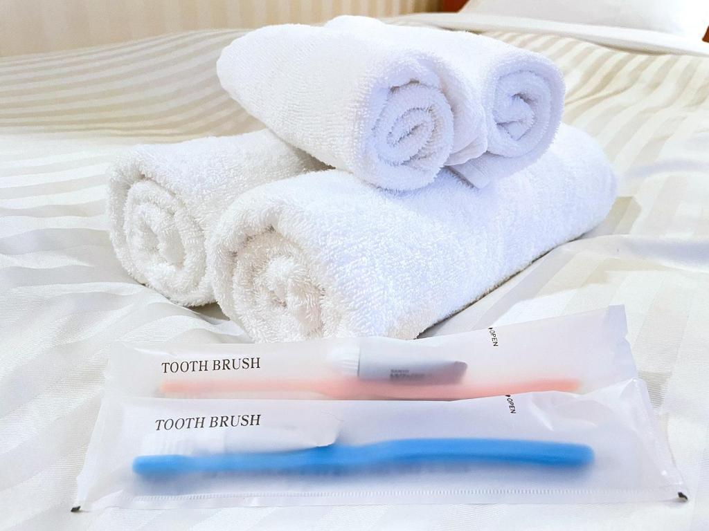 Postel nebo postele na pokoji v ubytování Hotel Castle Inn Yokkaichi