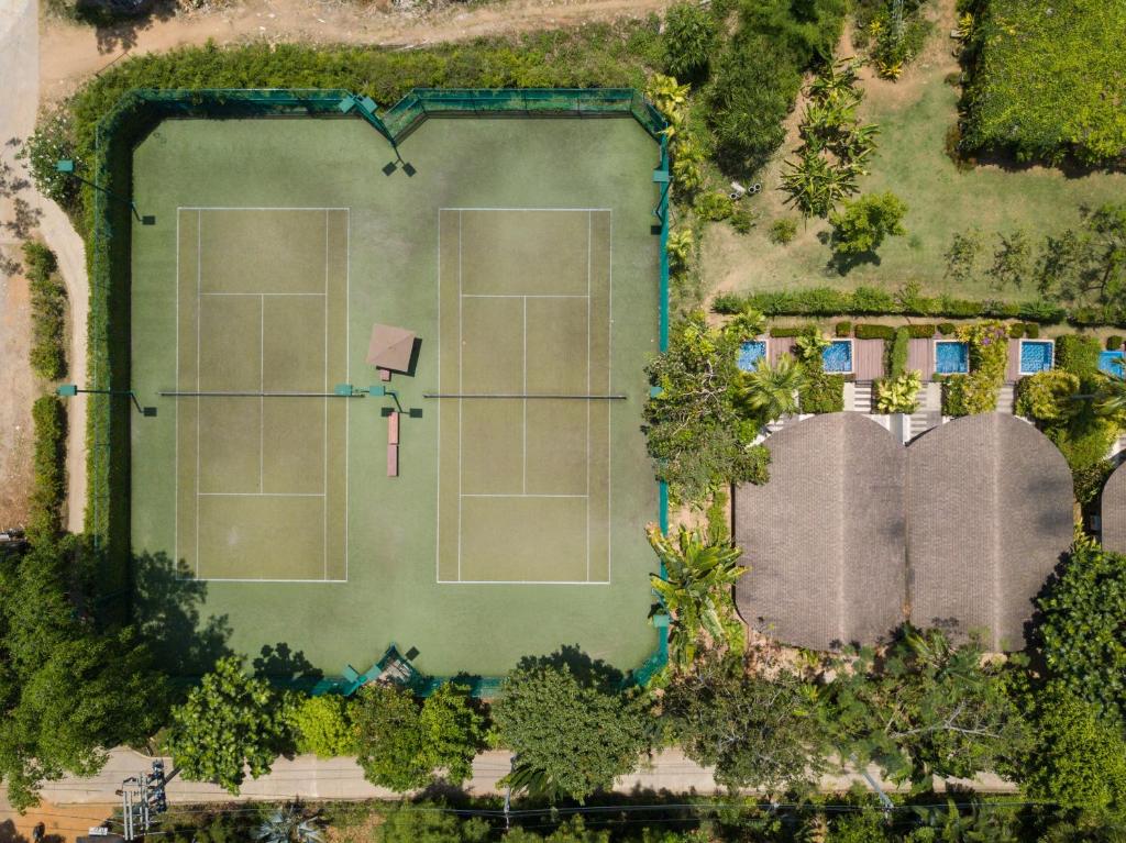 an overhead view of a tennis court with two courts at Barcelo Coconut Island, Phuket in Phuket Town