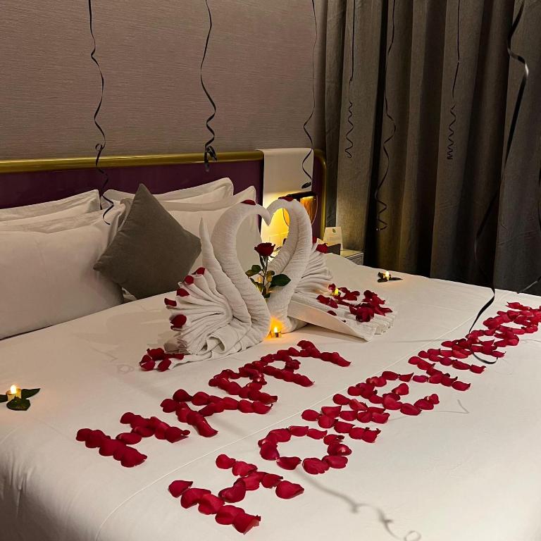 Postel nebo postele na pokoji v ubytování Marvelous Hotel