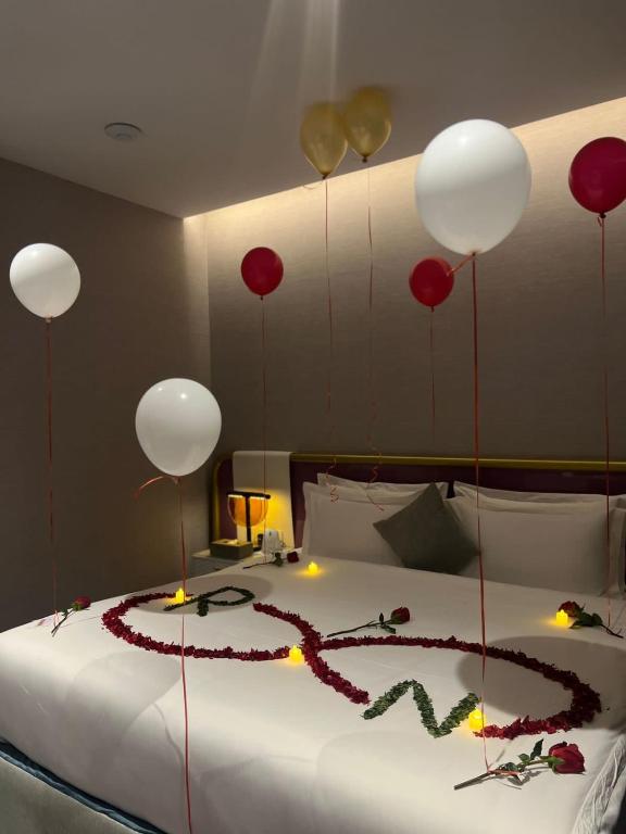 Postel nebo postele na pokoji v ubytování Marvelous Hotel