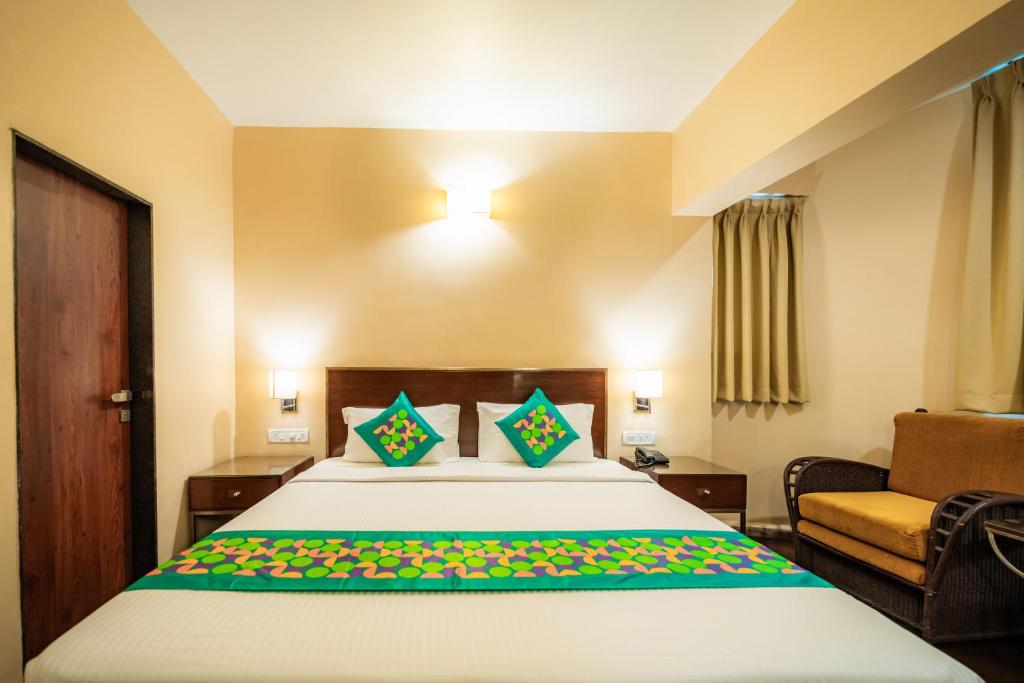 Postel nebo postele na pokoji v ubytování Treebo Sunshine Beach Resort