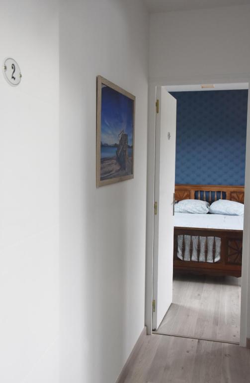 Postel nebo postele na pokoji v ubytování Le Presbytère du Talbert