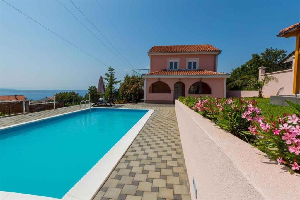 Villa with pool, large garden and beautiful sea view by TRAVELER tourist agency Krk - ID 2210