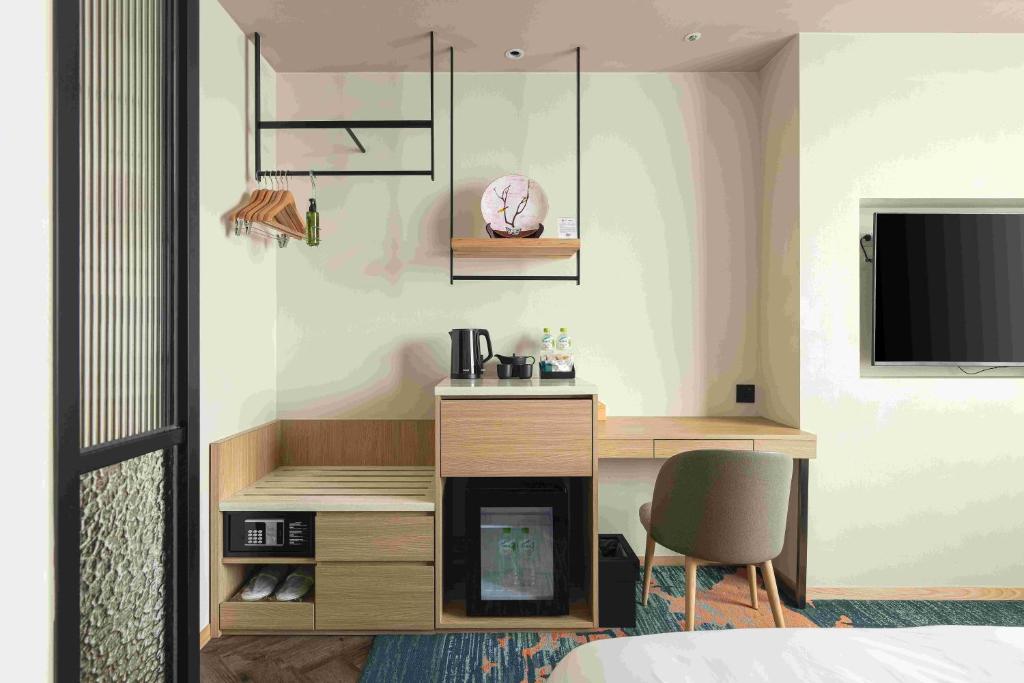 TV a/nebo společenská místnost v ubytování Solaria Nishitetsu Hotel Taipei Ximen