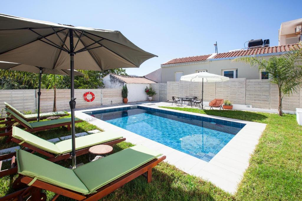 Πισίνα στο ή κοντά στο Peponas Residence